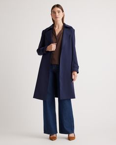 Made from our ultra-wearable stretch crepe, this trench coat will keep you looking polished with its unique wrinkle-resistant properties and sleek silhouette. Try on this timeless style and you'll quickly be impressed with how much of a wardrobe win it is.  | Quince | Women's Stretch Crepe Trench Coat in Navy, Size XL, Recycled Polyester Stretch Crepe, Trench Coats Women, Crepe Fabric, Polished Look, Quince, Try On, Timeless Style, Timeless Fashion, Coats For Women