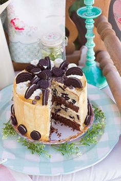 a cake on a plate with one slice cut out