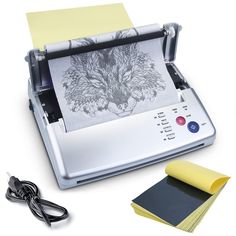 an image of a printer with paper on it and some other items to use in this project