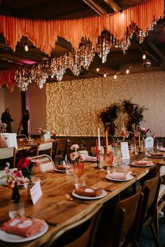 Trafalgar Warehouse Disco Wedding with Metallic Streamers and a wall of fairy lights with pink candles and stationery decorating the tables Belle Wedding Dresses, Metallic Bridesmaid Dresses, Industrial Wedding Venues, Metallic Wedding, Wedding Decorations On A Budget, Wedding Decor Inspiration, Outdoor Wedding Decorations