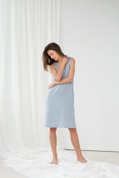 "Minimalist UMA sleeveless dress in light blue. - length is ± 105 cm (41.3\") (depends on size) - with pockets - straight cut - loose fit NOTE: This dress is oversized, please have this in mind when choosing your size. DETAILS: - 100 % European, pre-washed medium weight linen (205 g/m²) - the model is 180 cm (5′11″) high, wearing size S. - model measurements: bust 84 cm (33\") / waist 61 cm (24\") / hips 92 cm (36\") - color in the picture - light blue (you can choose other color on the right) M Casual Light Blue Linen Summer Dress, Blue Linen Summer Dress For Daywear, Summer Blue Linen Daywear Dress, Blue Summer Linen Dress For Daywear, Summer Blue Linen Dress For Daywear, Light Blue Linen Dress For Spring, Light Blue Linen Dresses For Spring, Sleeveless Blue Linen Spring Dress, Blue Sleeveless Linen Dress For Spring