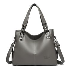 Color: Gray Faux Leather Shoulder Bag In Solid Color, Solid Color Faux Leather Shoulder Bag, Faux Leather Satchel Shoulder Bag In Solid Color, Trendy Solid Color Leather Bags, Rectangular Leather Bag In Solid Color, Solid Color Faux Leather Tote Bag, Solid Color Leather Bag For Errands, Leather Bag With Solid Color And Rectangular Shape, Solid Color Leather Hobo Bag