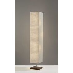 With this 57 inc two light column floor lamp with white rectangular shade you bring design along with some warm ambient lighting to your space. Unique and impactful, this column or tower shaped lamp is tall and rectangular emitting warm beautiful light. Use this lamp anywhere and elevate the look of the whole space. It is perfect for virtually any decor. 57.25 inc H x 10 inc W x 10 inc D. HomeRoots 57.25-in Walnut Floor Lamp | 4000372822 Column Floor Lamp, Walnut Floors, Crinkle Paper, Transitional Wall Sconces, White Floor Lamp, Cool Floor Lamps, Modern Pendant, Solid Metal, Floor Lamps