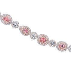 An elegant tennis bracelet showcasing 5.24 carats of GIA certified pink diamonds and 7.55 carats of round brilliant diamonds, set in 18 karat two tone gold. Dressy Hats, Diamonds Direct, Pink Diamond Ring, Pink Diamonds, Diamond Tiara, Diamond Tennis Bracelet, Diamond Bar, Tennis Bracelet Diamond, Brilliant Diamond