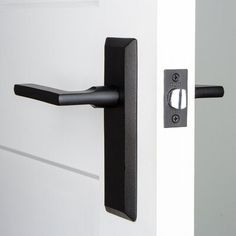 an open door with a black handle on it