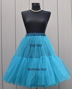 the top tiered tulle skirt is shown on a mannequin