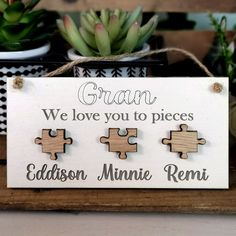 a wooden sign that says, we love you to pieces eddison minnie reni