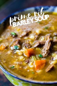 a close up of a bowl of soup on a table