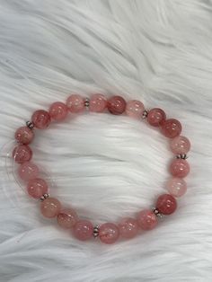 8MM Cherry Veine Jade Bracelet. Will fit wrist 7.75" - 8". Casual Hand-strung Stretch Bracelet, Casual Pink Gemstone Beaded Bracelets, Casual Pink Bracelets With Large Beads, Adjustable Hypoallergenic Crystal Bracelet With Round Beads, Hypoallergenic Adjustable Crystal Bracelet With Round Beads, Casual Pink Beaded Bracelet With Large Beads, Pink Beaded Stretch Bracelet For Healing, Adjustable Stretch Bracelet With Large Beads For Healing, Adjustable Beaded Bracelets With 8mm Beads