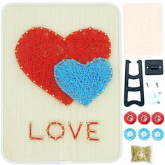 the craft kit includes yarn, buttons and scissors to make a heart - shaped card