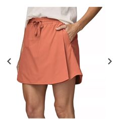 Nwt Xs Patagonia Skort In Color Sienna Clay. Has Biker Shorts With Side Pocket Underneath. Waist 13.5 In, Length 16 In In Middle, Curves Up A Little On Sides Skort Styling, Bike Commuting, Patagonia Shorts, Polyester Spandex Fabric, Commuter Bike, Chino Jeans, Rei Co-op, Patagonia Womens, Plain Weave