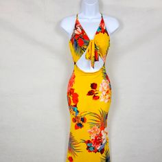 Cutout Yellow/Floral Maxi Dress From Touchdolls Boutique. Size Medium. Never Worn. Tags Still Attached Hawaiian Floral Print Holiday Dresses, Hawaiian Holiday Dresses With Floral Print, Tropical Floral Print Maxi Dress For Holiday, Tropical Floral Print Halter Neck Dress, Holiday Floral Print Halter Neck Dress, Tropical Halter Neck Dress With Floral Print, Halter Neck Floral Print Holiday Dress, Tropical Halter Neck Floral Print Dresses, Holiday Halter Neck Floral Print Dress