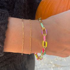 This chain bracelet is such a popular item. You can't go wrong with this fun piece! 14K gold plated. 6 inches with 1.5 inch extender and logo charm Multicolor Bracelet, Colorful Bracelet, Back Bag, New Launch, Colorful Bracelets, Karate, Arm Band, Chain Bracelet, Matcha