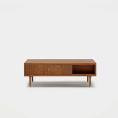 the sideboard is made out of wood and has an intricate design on it,