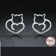 Adorable Cat And Heart Earrings In 925 Sterling Silver. Post Backings With Lock Closures. Perfect For Yourself Or As A Gift To Those Cat Lovers In Your Life. Very Unique And Different. Nwt Elegant Cat Ears Jewelry Gift, Sterling Silver Cat Ears Earrings Gift, Sterling Silver Cat Ears Earrings, Cute Silver Sterling Heart Earrings, Cute Silver Heart Earrings In Sterling Silver, Cute Silver Earrings For Valentine's Day, Cute Double Heart Silver Earrings, Silver Double Heart Cute Earrings, Cute Silver Earrings For Anniversary