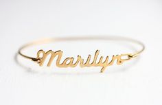 Vintage Name Bracelet - Marilyn Retro Gold Bangle As A Gift, Retro Gold Bangle As Gift, Retro Gold Bangle For Gift, Vintage Gold Personalized Bracelets, Personalized Vintage Gold Bracelets, Vintage Personalized Adjustable Bracelets, Vintage Personalized Bracelets For Gifts, Retro Gold Bracelets As Gift, Name Bracelet Gold