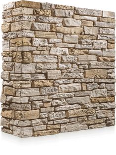 a stone wall that is made out of different types of rocks and has a white background