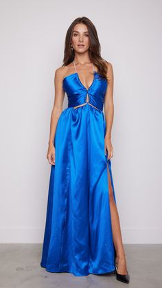 This blue maxi dress with sparkles and a straight neckline is perfect for those who want to make a memorable entrance. Its elegant design and sparkling details ensure you will shine at any event, making it a timeless and versatile piece in your wardrobe Features: Maxi Style Straight Neckline Blue Sparkle Open Back Model is wearing a small 78530 D6-1 Glamorous Maxi Dress For Party Season Evening, Glamorous Floor-length Maxi Dress For Night Out, Floor-length Dresses With Side Slits For Prom, Satin Maxi Dress With Side Slits For Evening, Satin Maxi Dress With Side Slits For Night Out, Gala Maxi Dress For Party Season, Evening Party Maxi Dress, Dressy Maxi Dress For Gala Night Out, Dressy Gala Maxi Dress For Night Out