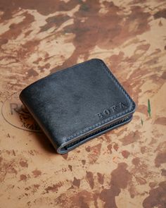 Discover the style and functionality with this Black Leather Bifold Wallet, a distinctive accessory designed to make a statement. Crafted with meticulous attention to detail, this luxury men's wallet combines the natural elegance of leather creating a unique and sophisticated look for the modern men. Perfect for those who appreciate a blend of traditional craftsmanship and aesthetics, this wallet is not only a practical essential but also a reflection of luxury style. DETAILS: -Premium Italian f Black Leather Wallet With Engraved Logo, Black Leather Wallets With Engraved Logo, Black Rectangular Wallet With Engraved Logo, Classic Black Wallet With Engraved Logo, Black Wallets With Engraved Logo For Everyday Use, Modern Leather Wallets With Engraved Logo, Luxury Wallets With Engraved Logo For Everyday Use, Luxury Wallets With Engraved Logo, Classic Bifold Wallet With Engraved Logo