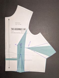 the assembly line is cut out to be used as a sewing pattern for an apron