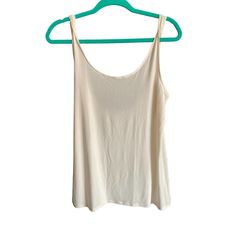 Nwt Onzie Womens Glossy Flow Seamless Yoga Top Sleeveless One Size Cream Description: Condition: New With Tags Brand: Onzie One Size Color: Cream Seamless Scoop Neck Sleeveless Knot Back Tank Imported Sleeveless Beach Camisole With Built-in Bra, Summer Stretch Tank Vest, Stretch Cami Vest For Summer, Summer Stretch Camisole Tank Top, Summer Tank Top With Wide Straps, Sleeveless Summer Tank Top With Built-in Bra, Sleeveless Tank Top With Built-in Bra For Summer, Stretch Cami Tank Top For Beach, Stretch Camisole Tank Top For Beach