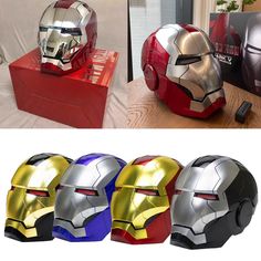 three different types of iron man helmets on display