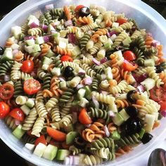 This easy rainbow pasta salad with tri-colored pasta, tomatoes, cucumber, red onion, and Italian-style dressing is great for picnics and potlucks. Rainbow Pasta Salad, Salad Calories, Rainbow Pasta, Classic Macaroni Salad, Creamy Pasta Salads, Avocado Pasta Salad, Best Macaroni Salad, Easy Pasta Salad Recipe, Ambrosia Salad