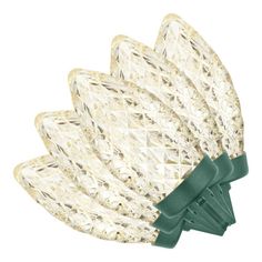 white christmas lights with green bows on each end and one light in the shape of a flower