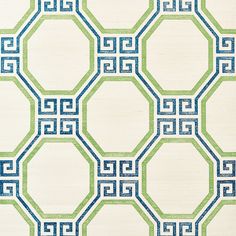 a green and blue geometric pattern on fabric