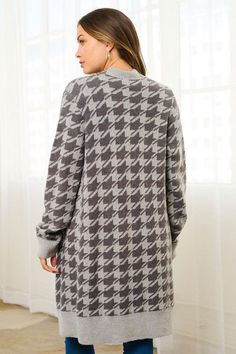 Upgrade your wardrobe with our Charcoal & Houndstooth Cardigan! Made from a luxurious blend of 65% acrylic and 35% nylon, this open front cardigan features a classic houndstooth pattern and long sleeves. The super soft fabric will keep you cozy and stylish all day long. Bust Measurements: Small: 40” Medium: 42 Large: 44” Long Sleeve Houndstooth Cardigan For Fall, Fall Jacquard Knit Cardigan For Layering, Winter Long Sleeve Houndstooth Cardigan, Long Sleeve Houndstooth Pattern Winter Cardigan, Winter Houndstooth Long Sleeve Cardigan, Long Sleeve Houndstooth Cardigan For Winter, Houndstooth Long Sleeve Cardigan For Work, Cozy Jacquard Knit Cardigan For Fall, Fall Houndstooth Cardigan For Workwear