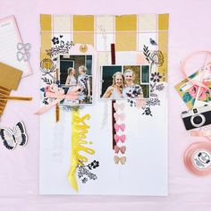 an open scrapbook with photos and ribbons