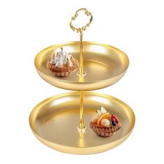 two tiered trays with food on them, each holding an individual's plate