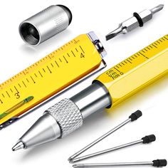 an assortment of tools including a pen, ruler and screwdriver