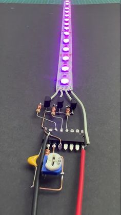 an electronic device is being used to test the voltages and current in a circuit