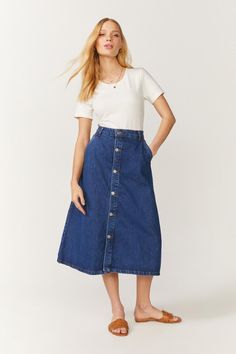 Forget your jeans - try a denim skirt instead! Proving it's just as versatile, this midi comes in a super-flattering A-line shape and stylish button-up detailing. A Line Jeans Skirt, Aline Denim Skirt, Blue Midi Skirt Outfit Summer, Aline Denim Skirt Outfits, Denim A Line Skirt Outfit, Aline Skirt Outfit, Long Denim Skirt Outfits, Denim Skirt Midi, A Line Skirt Outfits