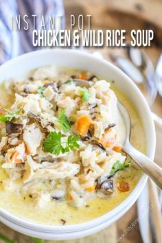 a white bowl filled with chicken and wild rice soup