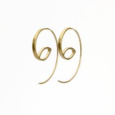 These are minimalist delicate gold hoop earrings, handmade of yellow 14k solid gold. I made these gold hoops of a rectangle gold wire, 2 mm wide x 1 mm thick. They have a delicate matte finish. Width of the delicate long ear wire (the wire that goes into the ear lobe) is 0.8 mm = about 0.3 inch. These modern hoops are unique, and will add chic to any outfit. They are perfect for everyday's wear, as well as for a night out. Elegant, minimal and eye catching. Total length of the earrings is 3.1 cm Minimalist Spiral Earrings For Everyday Wear, Minimalist Spiral Everyday Earrings, Minimalist Everyday Spiral Earrings, Modern Spiral Hoop Earrings As Gift, Gold Minimalist Spiral Wrap Earrings, Minimalist Gold Spiral Wrap Earrings, Minimalist Yellow Gold Wrap Earrings As Gift, Minimalist Yellow Gold Wrap Earrings, Gold Modern Wrap Earrings