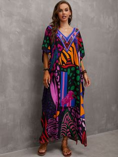 In limited supply!!! Vibrantly printed v-neck mid-sleeve mu-mu loose fit dress kaftan maxi dress. Beautiful styles to choose from. Easy & effortless to wear.

In-Stock Item: 2-day processing. Shipped in 4-7 days. Moroccan Kaftan Dress, Plus Size Kaftan, Chiffon Kaftan, Kaftan Maxi Dress, Long Kaftan, Bathing Suit Covers, Bathing Suit Cover Up, Loose Fitting Dresses, Womens Kimono