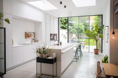 the kitchen is clean and ready to be used as a living room or dining area