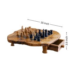 a wooden chess board with two pieces on it