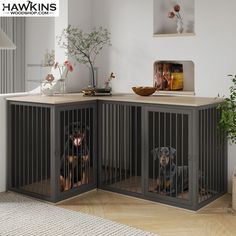 two dogs sitting in their kennels at the end of a living room table