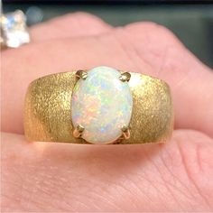 14k Yellow Gold Genuine Opal Thick Dome Ring Vintage Estate Solid 14k Yellow Gold Genuine Natural Opal Brushed (Textured) Dome Band Size - 8.5 Professionally Cleaned, Buffed, And Polished Gift Box Included October Birthstone Weight - 8.45 Grams Absolutely Stunning Cabochon Cut Oval Genuine Opal On A Thick, Brushed 14k Yellow Gold Domed Band. Beautiful Flashes Of Color - True Opal (Not Doublet Or Triplet). Heavy, Well Made Ring With Brushed Textured Band. Dome Style Ring. Vintage Estate, Jewelry, Anniversary Opal Ring Stamped 14k In Oval Shape, Classic Opal Jewelry With Polished Finish, Formal 14k Gold Polished Opal Ring, Formal 14k Gold Opal Ring With Polished Finish, Fine Jewelry 14k Gold Opal Ring With Polished Finish, Yellow Gold Polished Opal Ring, Oval Opal Ring In Yellow Gold Stamped 14k, 14k Gold Opal Ring With Polished Finish, Classic Oval Opal Jewelry