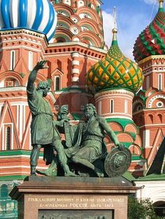 an image of a statue in front of a building