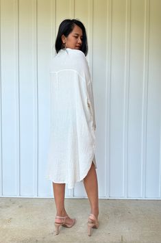 Relax in style with the Aura shirtdress, a unique take on traditional loungewear. Made from breathable double gauze cotton, it's perfect for casual wear out, at home, or even as a beach coverup. The button-down design adds a touch of style and versatility to your wardrobe, ensuring comfort and convenience as you go about your day. White Aura, Cotton Shirt Dress, Hang Loose, Double Gauze, Midi Shirt Dress, White Shirt Dress, Shirtdress, Relaxed Style, Up Styles