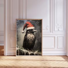 a black and white bird wearing a santa hat