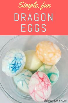 some soap balls are in a bowl with the words simple fun dragon eggs on it