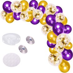 balloons and confetti are arranged in the shape of a arch with gold, purple and white balls