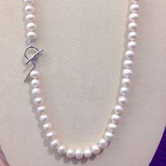 Stunning 18” White Pearl Strand Never Worn With A Sterling Circle Toggle Closure. Adjustable White Necklace With Toggle Clasp, Adjustable Pearl Necklace With Lobster Clasp, Elegant Round Toggle Necklace Adjustable, Elegant Round Adjustable Toggle Necklace, Elegant Adjustable Round Toggle Necklace, Classic Pearl Necklace With Toggle Clasp, Elegant Round Toggle Necklace With Sterling Silver Clasp, White Pearl Necklace With Toggle Clasp, Classic Adjustable Necklaces With Sterling Silver Clasp