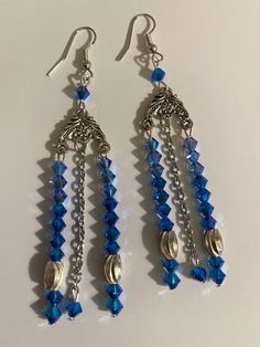 Blue Dangle Crystal Earrings With Dangling Beads, Blue Crystal Dangling Earrings, Blue Dangle Beaded Earrings, Blue Crystal Earrings With Dangling Beads For Gift, Blue Long Drop Chandelier Earrings, Blue Beaded Crystal Earrings With Round Beads, Blue Beaded Round Crystal Earrings, Blue Beaded Crystal Dangle Earrings, Blue Long Drop Beaded Earrings As Gift