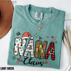 Christmas Cotton Top With Graphic Print, Christmas Cotton Tops With Graphic Print, Christmas Printed Crew Neck Top, Christmas Green T-shirt With Letter Print, Green Christmas T-shirt With Letter Print, Christmas Letter Print Cotton Tops, Christmas Cotton Tops With Custom Print, Christmas Green Cotton T-shirt, Christmas Cotton Printed Tops